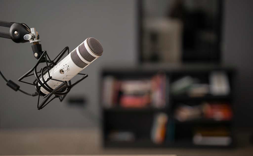 Podcast microphone on a boom Audiobook Production Guide